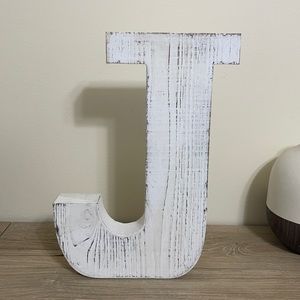 White washed “J”